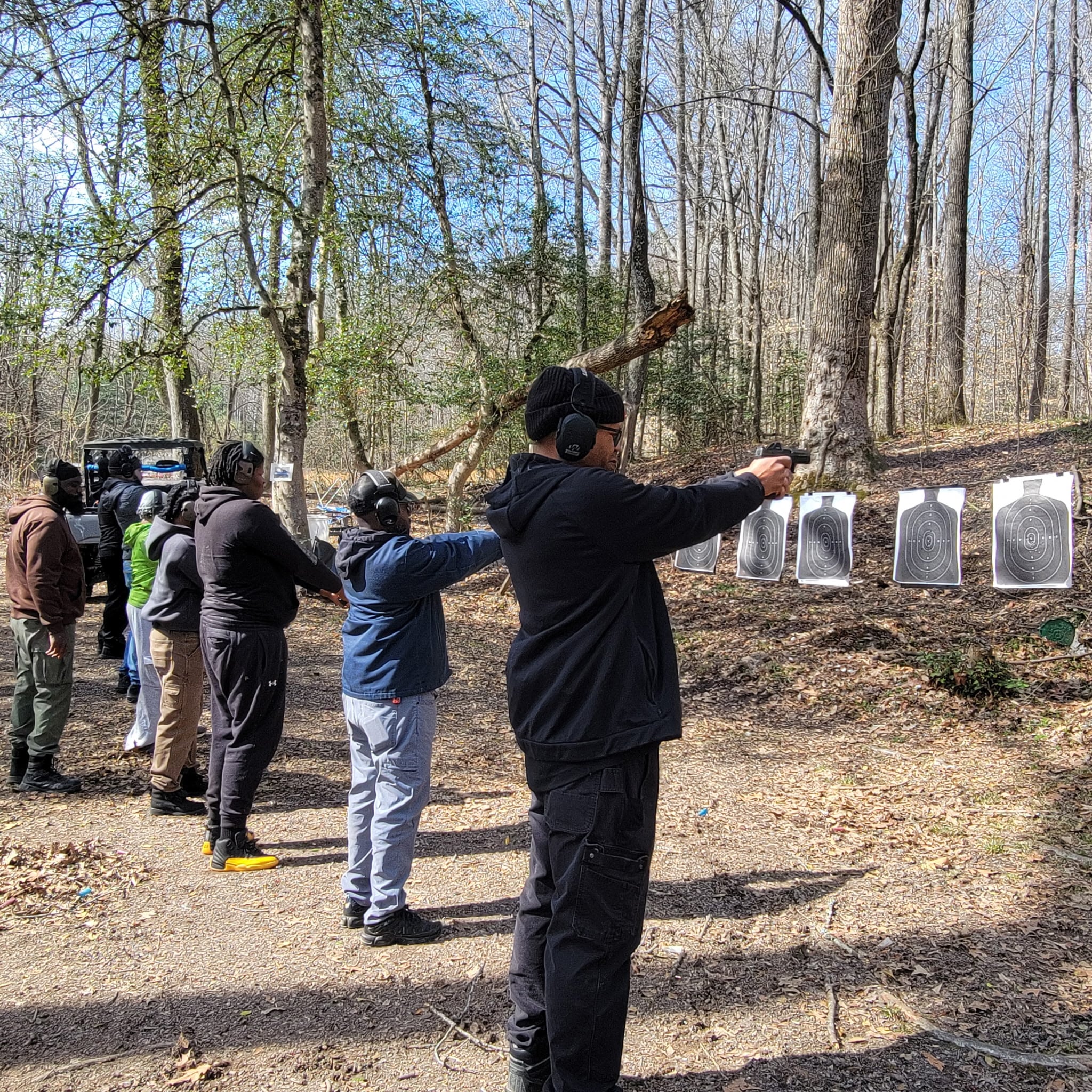 Students completing a supervised live-fire exercise in individual lanes